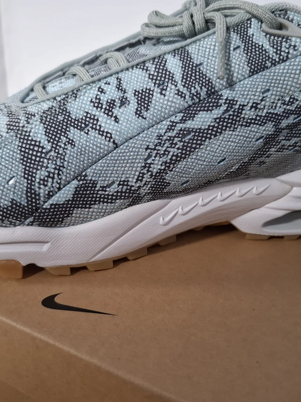 Nike Light Blue Gray Patterned Lace-Up Sneakers